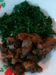 A picture of Beef fried with sukuma wiki.