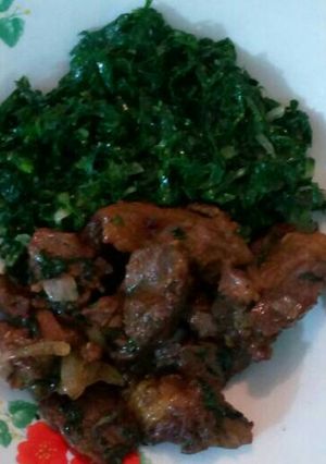 A picture of Beef fried with sukuma wiki.