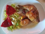 Una foto de cuartos de pollo a la cerveza
