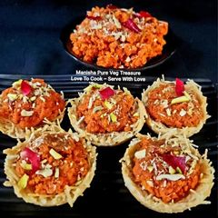 A picture of Gajar Halwa In Vermicelli Basket - Gajar Halwa In Seviyan Katori.