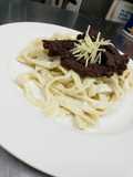 Pasta Fetuccini en salsa alfredo con Churrasco