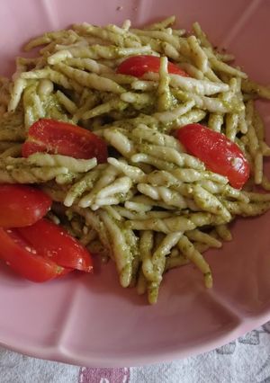 A picture of Trofie with Pesto and Cherry Tomatoes.