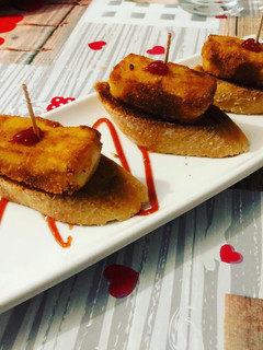 Una foto de Queso de Cabra frito con tosta