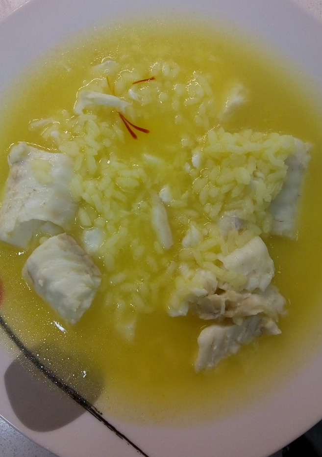 Una foto de Sopita de pescado y arroz