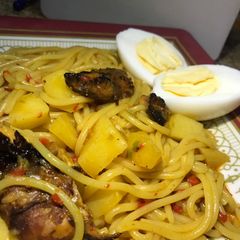 Pasta and garnish chicken A picture of Pasta and garnish chicken.