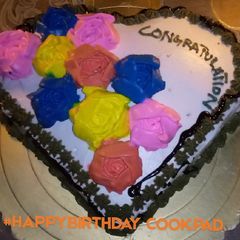 A picture of Congratulations cake made by me fudgcake inside.