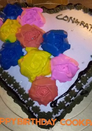 A picture of Congratulations cake made by me fudgcake inside.