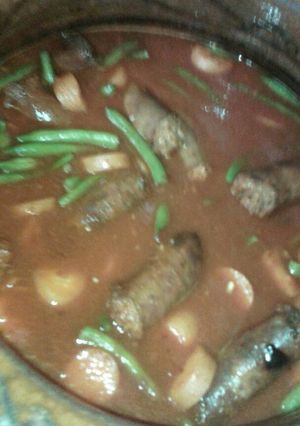 Una foto de Longaniza con ejotes y zanahorias en huajillo