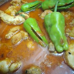 A picture of Chicken Achar gosht.
