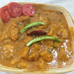 A picture of Chicken 65 with gravy.