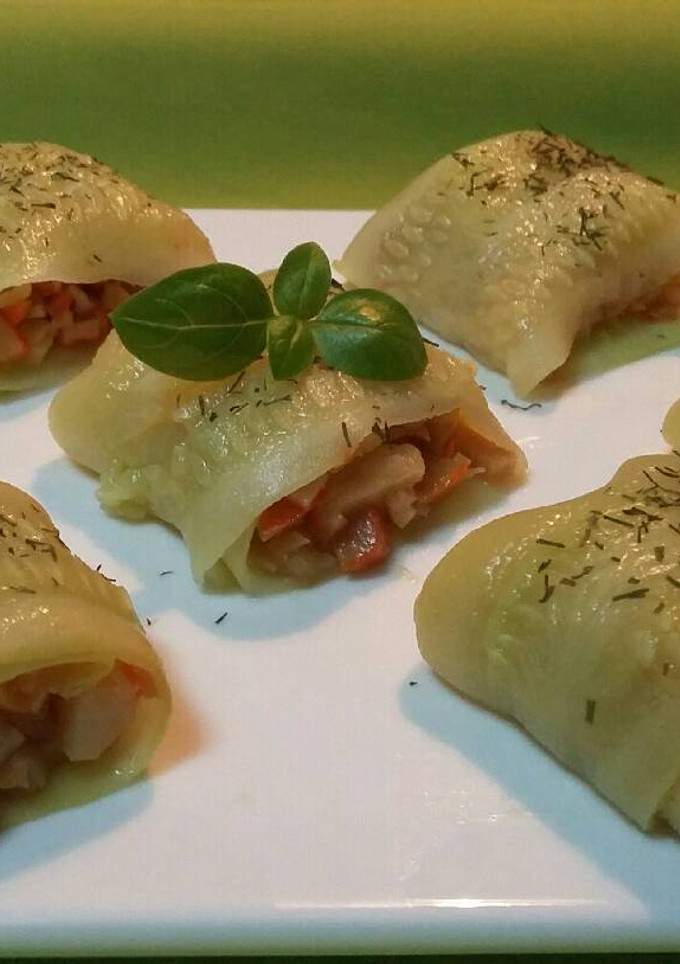 Una foto de Rollitos de calabacín rellenos