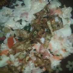 A picture of Chinchulines provenzal (light) con ensalada de arroz primavera.
