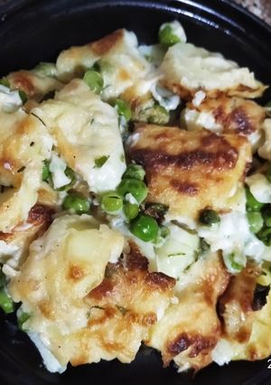 Une photo de Gratin de pomme de terre et petit pois