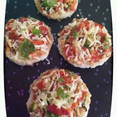 A picture of Mini bread pizza.