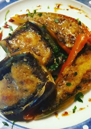 A picture of Light Stuffed Eggplant and Bell Peppers - Ground Meat, Provolone, and Parmesan.