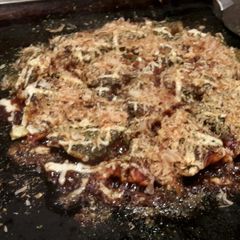 A picture of Okonomiyaki Japanese savory pancake.