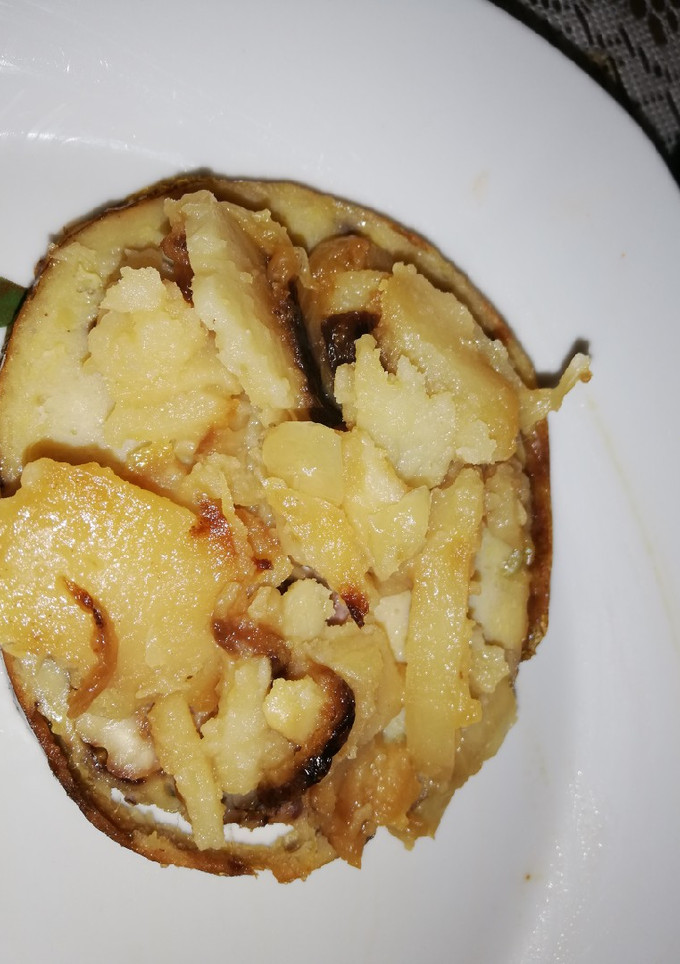 Una foto de Redondo de pollo con nueces y queso azul asado