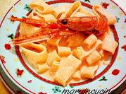 Una foto di calamarata pasta