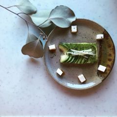 A picture of Avocado pickled in miso.