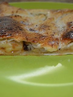 Una foto de Empanada de pasas y manzana