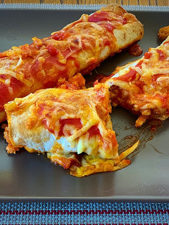 Una foto de Enchiladas de pollo con piparras