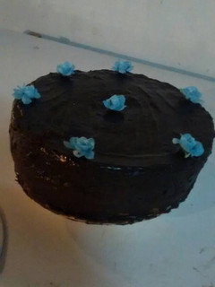 Una foto de Torta con baño de chocolate