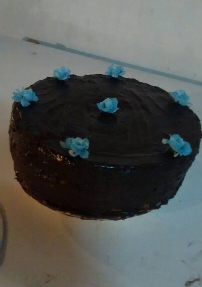 Una foto de Torta con baño de chocolate