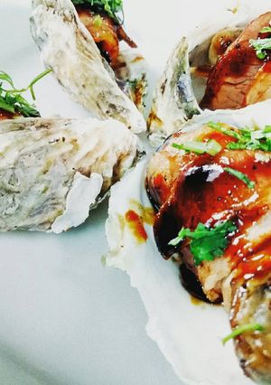 Hình của món Hàu cuộn thịt xông khói nướng.