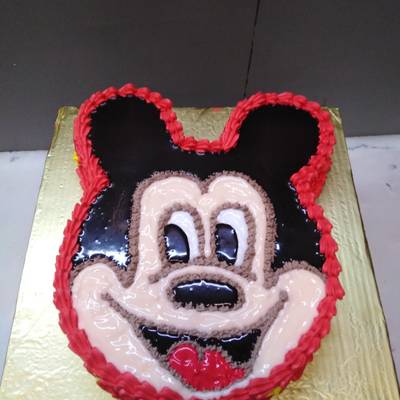 Mickey mouse cake Recipe by Chef Kumail - Cookpad