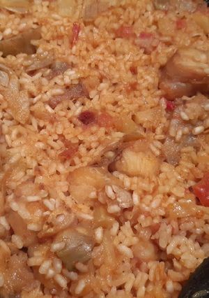 Una foto de Arroz con verduras y rape