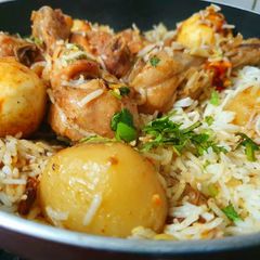 A picture of Mughlai Chicken Biryani.