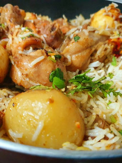 A picture of Mughlai Chicken Biryani.