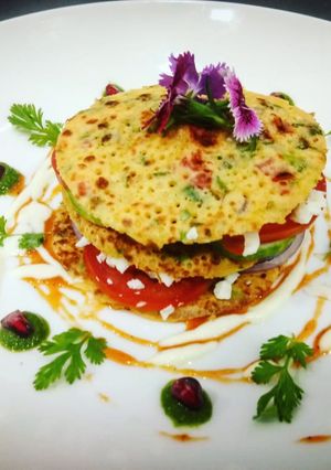 A picture of Besan chilla burger.