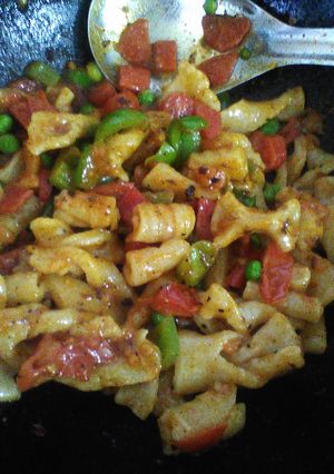 A picture of Homemade macaroni/ pasta with vegetable tadka.