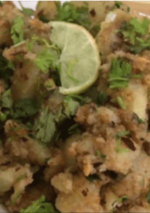 A picture of Fried potatoes with water chestnut flour (Singhara aata).