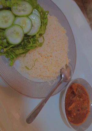 A picture of Rice and stew.