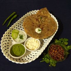 A picture of Chana paneer paratha.