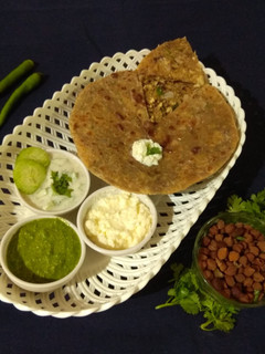 A picture of Chana paneer paratha.