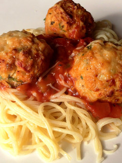 A picture of Chicken Meatballs with Garlic Spaghetti.