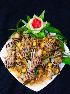 Hình của món Ốc hương xào bơ tỏi.