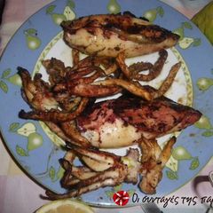 A picture of Barbecued thrapsala with grilled vegetables.