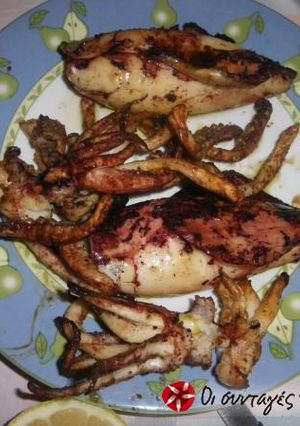 A picture of Barbecued thrapsala with grilled vegetables.