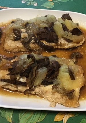A picture of Monkfish Fillets with Porcini Mushrooms, Apple, and Lemon.