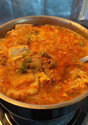 A picture of Kimchi Tofu Stew (순두부찌개).