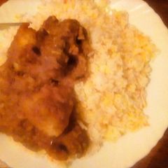 A picture of Biryani stew and rice.