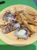 Filetes de merluza con quesos y especias al horno