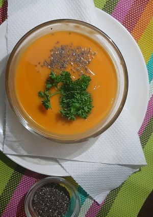 A picture of Butternut soup with chia seeds toppings.