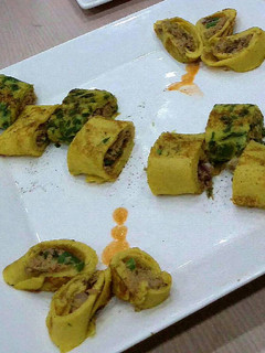 A picture of Tuna stuffed crépes.