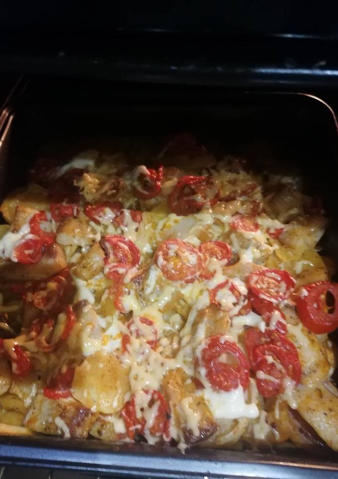 Тилапія запечена з овочами