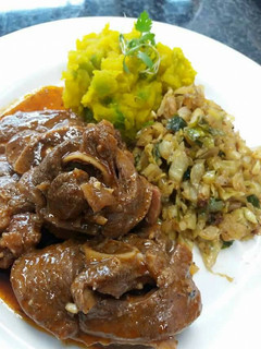 A picture of Tasty oxtail with veggies.